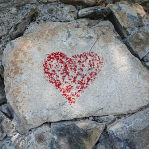 a rock with a heart carved into it